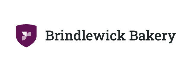 Brindlewick Bakery logo: Roboto Slab 500, horizontal layout, tiles symbol, navy and pink and teal