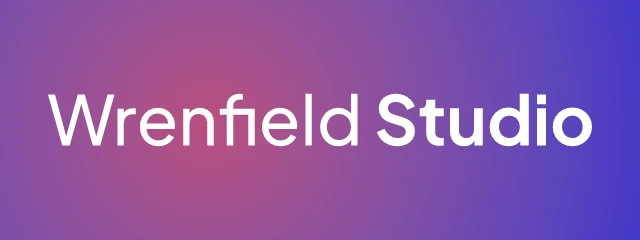 Wrenfield Studio logo: Plus Jakarta Sans 500, wordmark layout, none symbol, navy and blue and pink