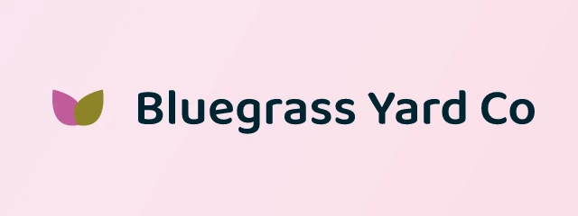 Bluegrass Yard Co logo: Baloo 2 600, horizontal layout, leaf symbol, navy and pink and yellow