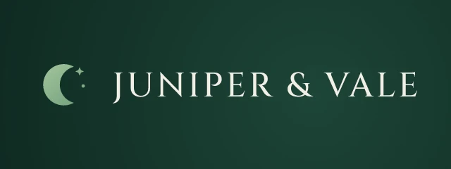 Juniper & Vale logo, AI direction 2: deep forest night, refined and mysterious